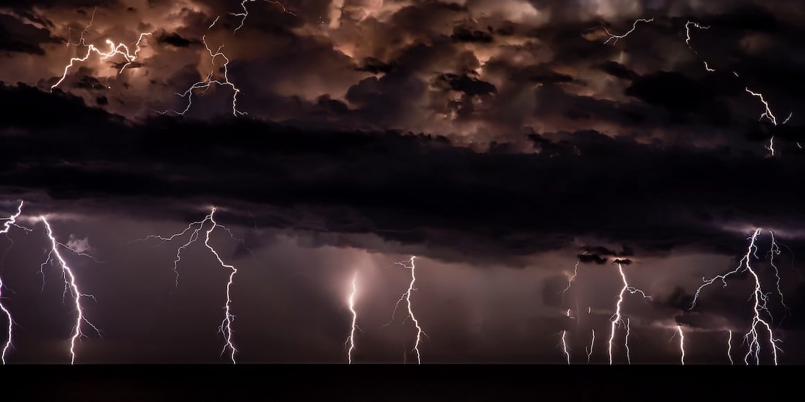 IT Risk Management being depicted through a lightning storm. 
